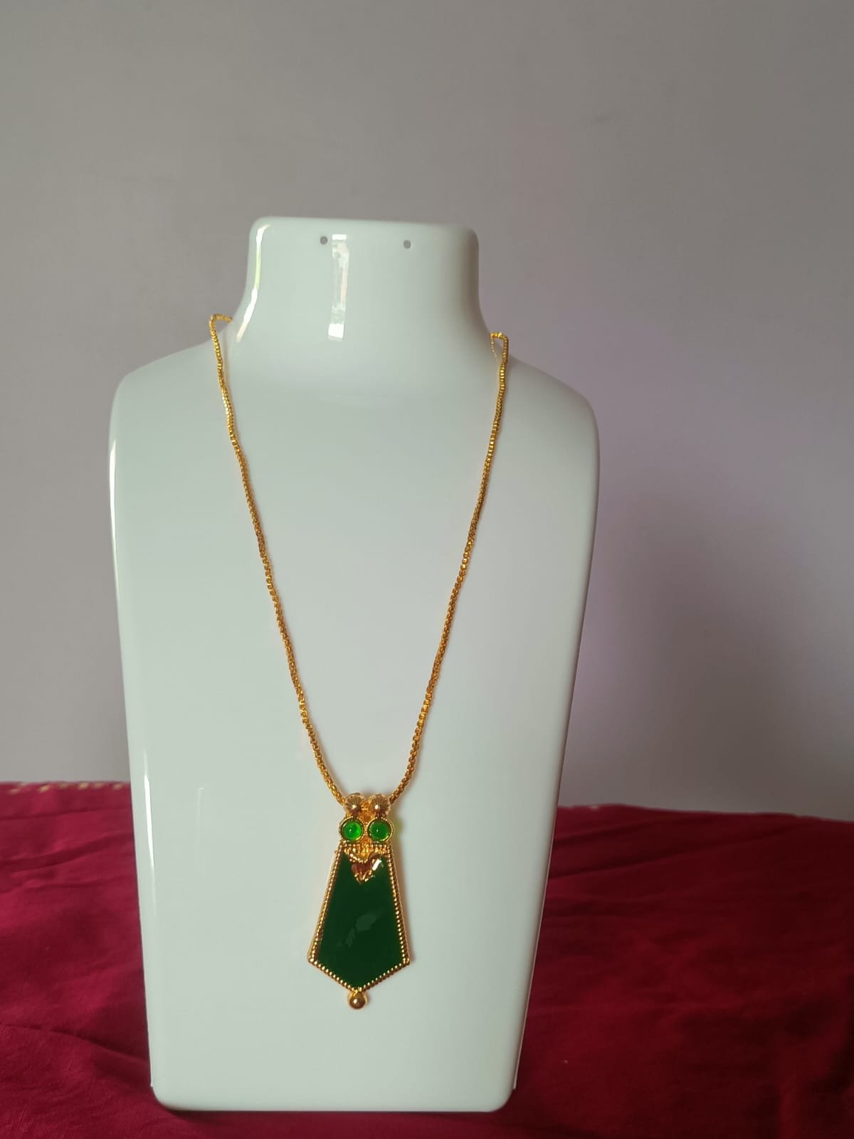 classic pendant gold plated chain with green stone